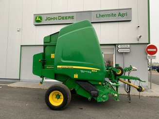 Presse à balles rondes John Deere 864 - 1